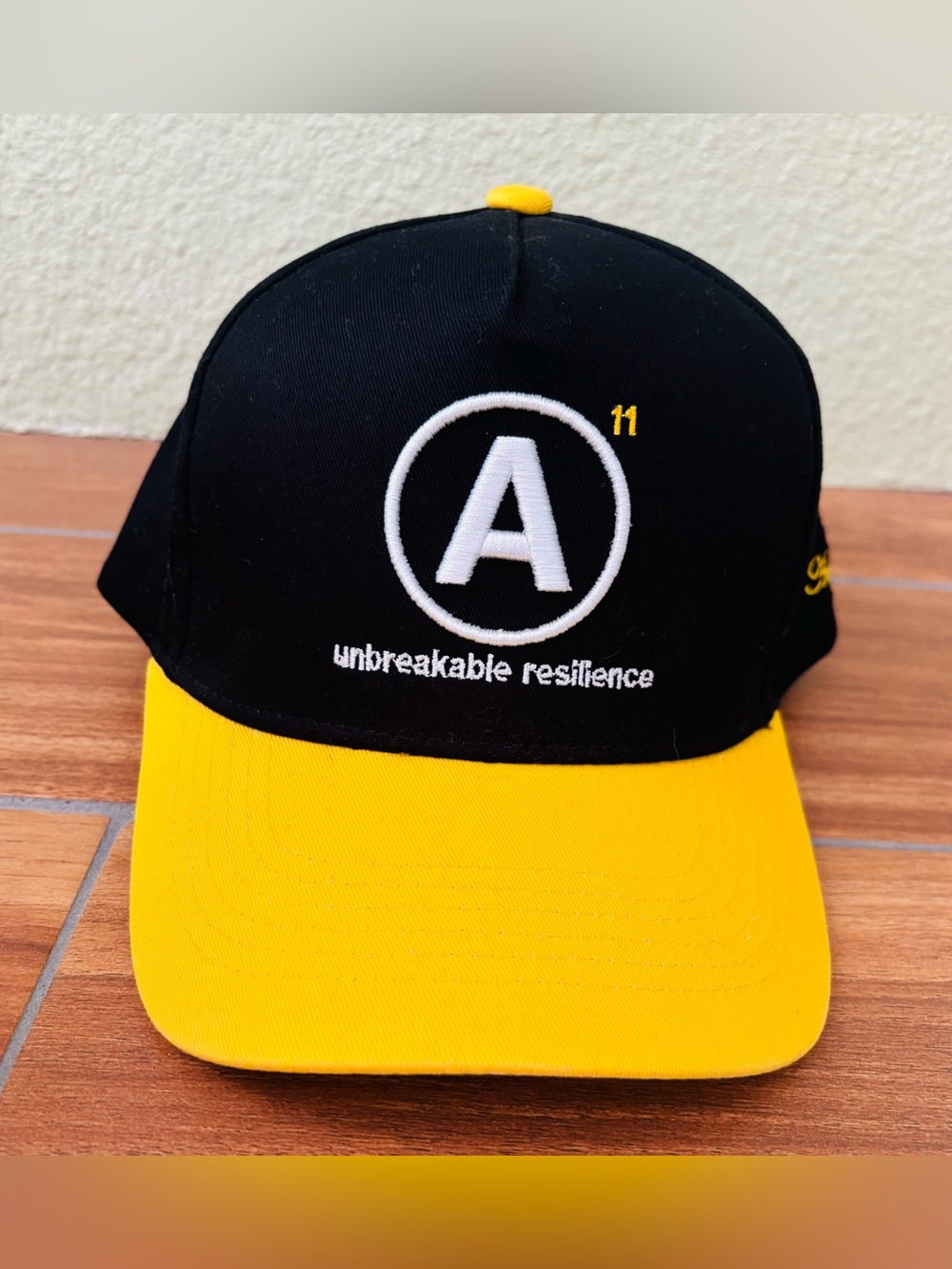 Aug 11 "Mega Snap Back" Black Yellow Hat Embroidered White Lettering w/"A" logo